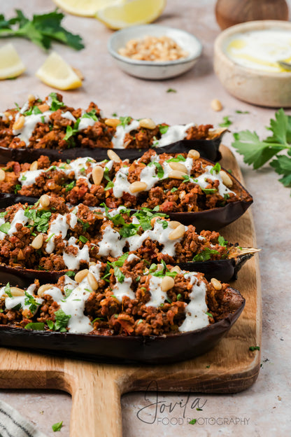 Mediterranean Stuffed Eggplant With Garlic Yogurt Sauce