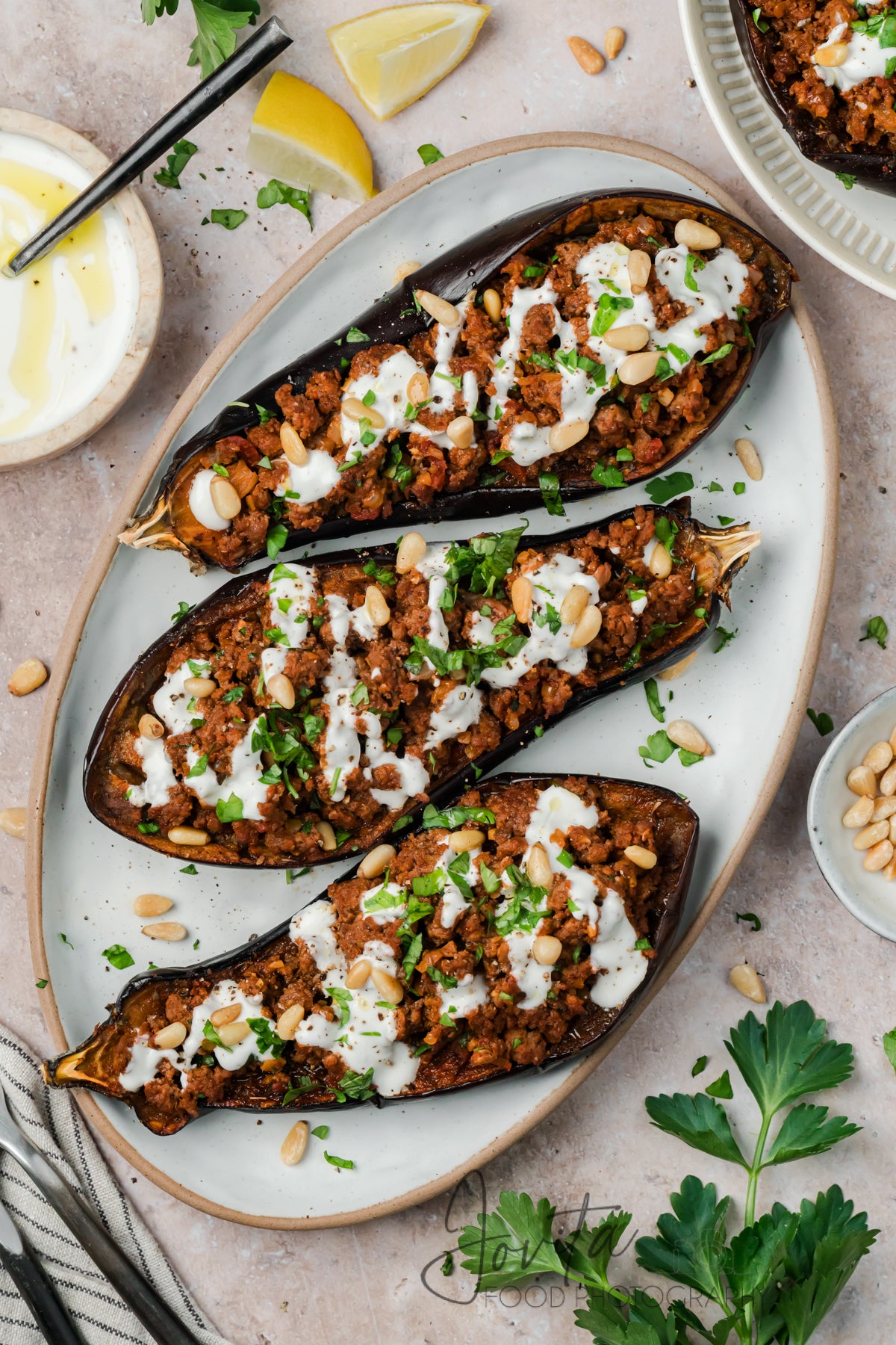 Mediterranean Stuffed Eggplant With Garlic Yogurt Sauce