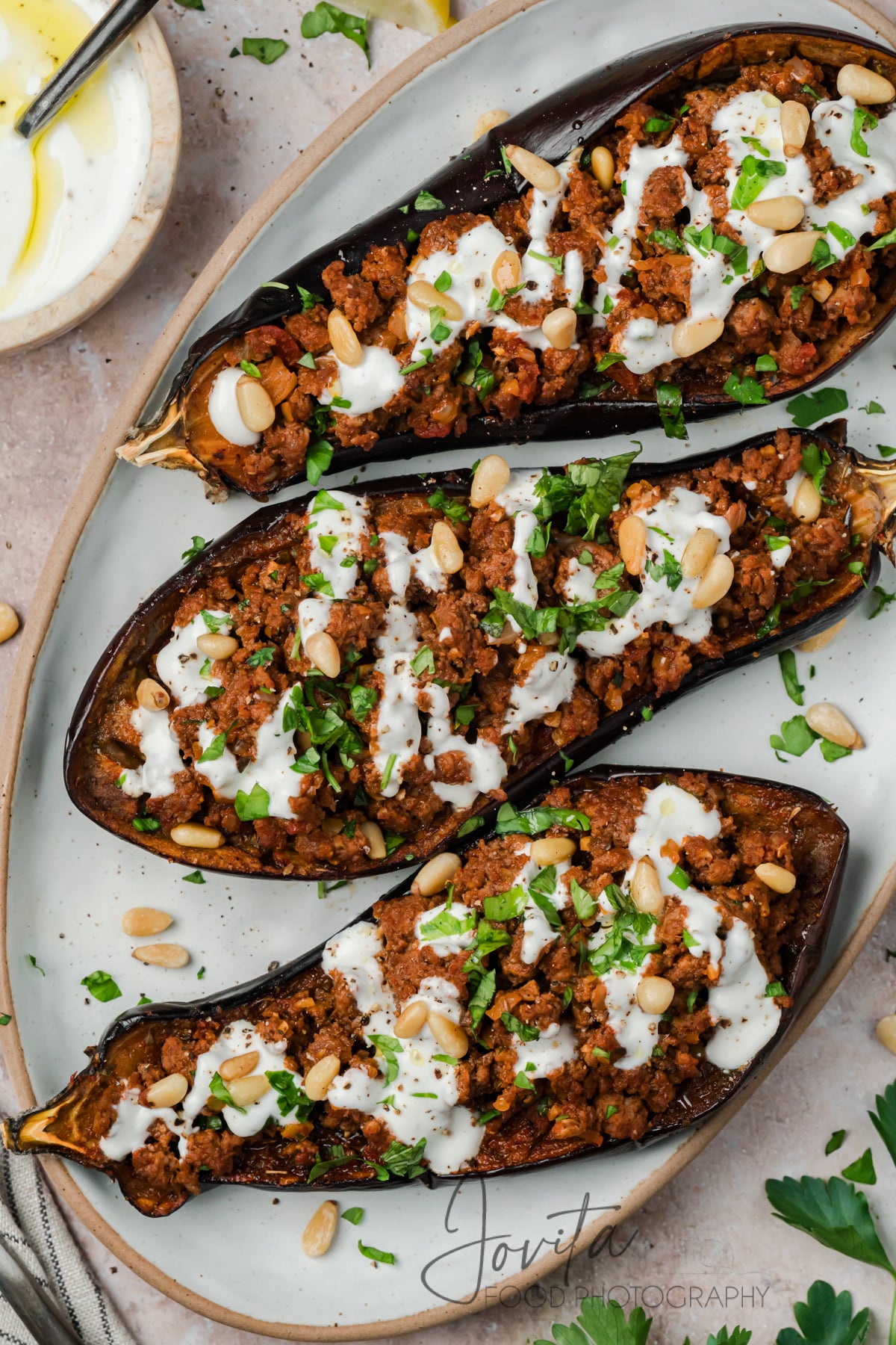 Mediterranean Stuffed Eggplant With Garlic Yogurt Sauce