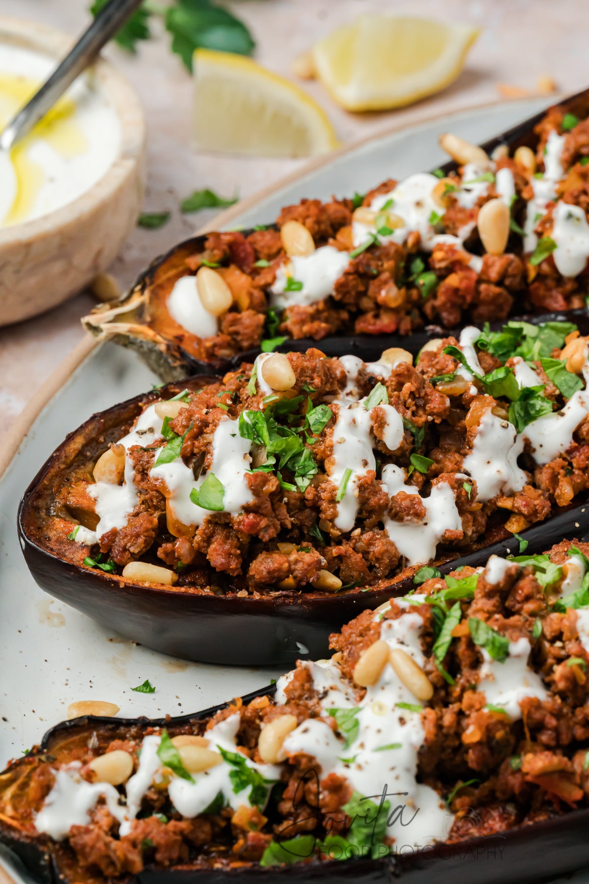 Mediterranean Stuffed Eggplant With Garlic Yogurt Sauce