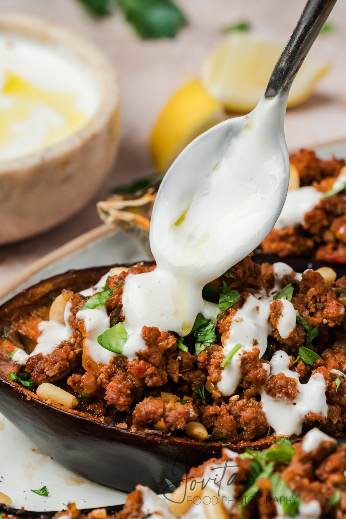Mediterranean Stuffed Eggplant With Garlic Yogurt Sauce