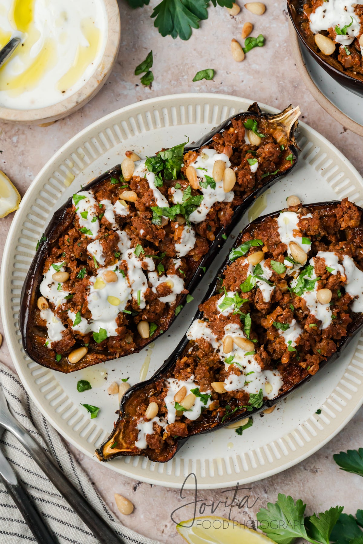 Mediterranean Stuffed Eggplant With Garlic Yogurt Sauce