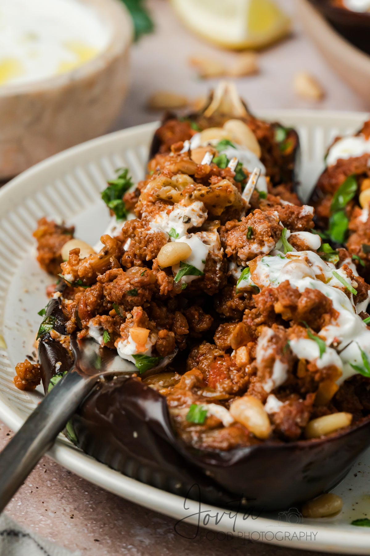Mediterranean Stuffed Eggplant With Garlic Yogurt Sauce