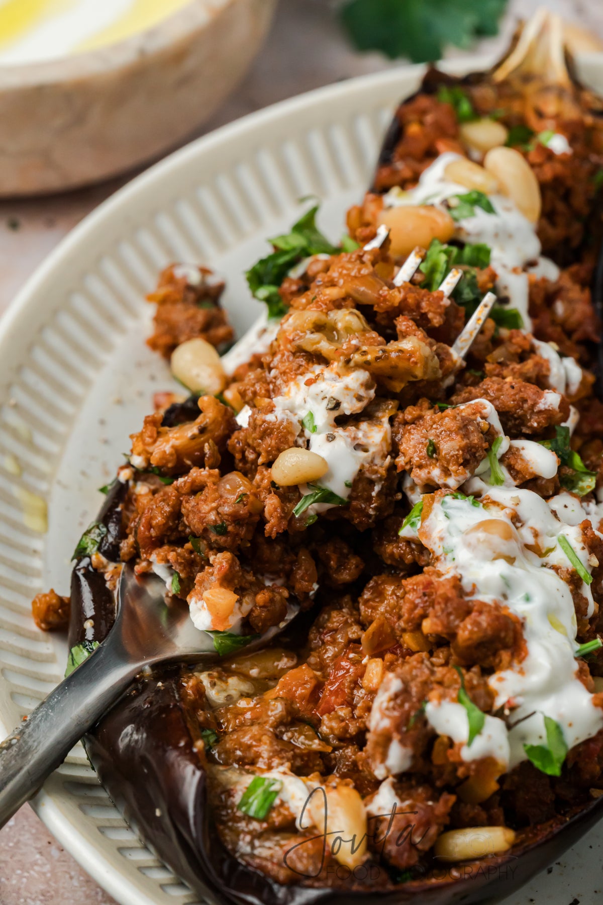Mediterranean Stuffed Eggplant With Garlic Yogurt Sauce