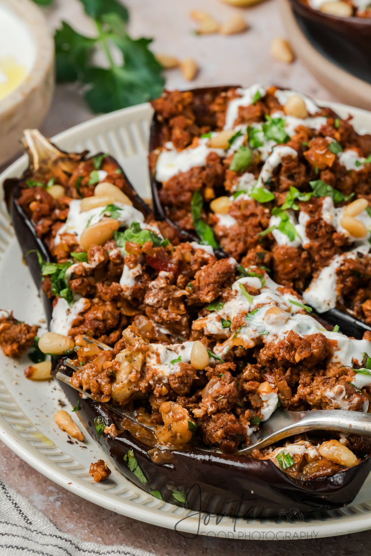 Mediterranean Stuffed Eggplant With Garlic Yogurt Sauce