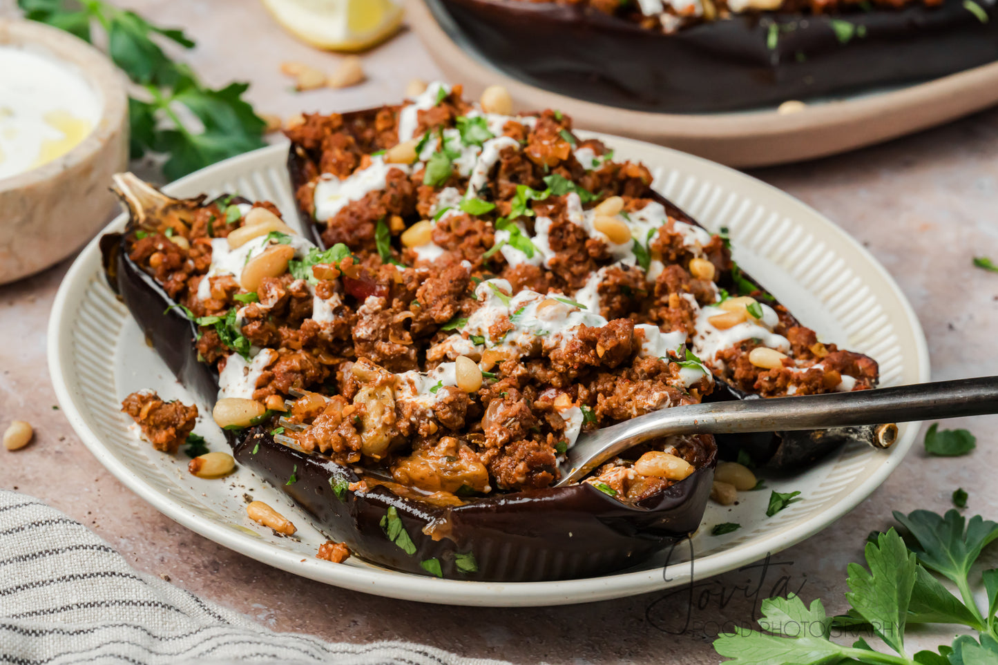Mediterranean Stuffed Eggplant With Garlic Yogurt Sauce