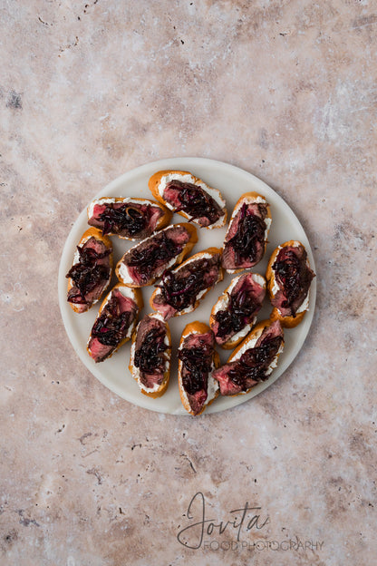 Steak Crostini with Goat Cheese & Caramelized Onions